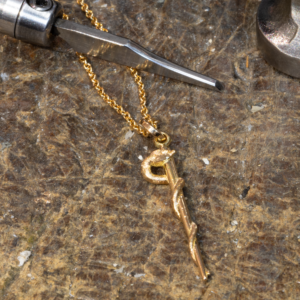 Eskulapstav 18k Guld pin Läkarsymbol